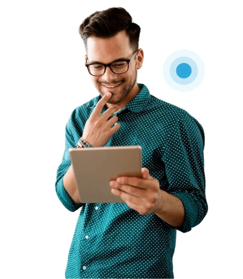 A man holding a tablet with a blue light on it.